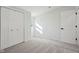Bright bedroom with soft gray carpet, double closet and a window at 4844 N 700 W, McCordsville, IN 46055