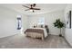 Spacious bedroom offers natural light and a ceiling fan at 4844 N 700 W, McCordsville, IN 46055