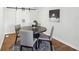 Cozy dining area features a round wood table and seating for four at 4844 N 700 W, McCordsville, IN 46055