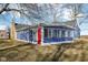 Blue home addition features bright, natural light and a vibrant red door at 4844 N 700 W, McCordsville, IN 46055