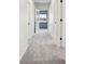 Bright hallway featuring fresh paint, neutral carpet, and natural light at 4844 N 700 W, McCordsville, IN 46055