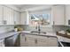 Modern kitchen with white cabinets, and sleek countertops at 4844 N 700 W, McCordsville, IN 46055