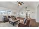 Open concept living room with wood floors, vaulted ceilings, and lots of natural light at 4844 N 700 W, McCordsville, IN 46055
