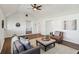 Bright living room with wood floors, neutral furniture and vaulted ceiling at 4844 N 700 W, McCordsville, IN 46055