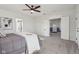 Large main bedroom boasts neutral paint, carpet floor, and lots of windows at 4844 N 700 W, McCordsville, IN 46055
