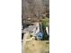 Birds eye view of home on a large lot, featuring mature trees and a long private drive at 5014 Melbourne Rd, Indianapolis, IN 46228
