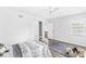 Bright bedroom with ceiling fan, ample closet space, and a comfortable bed for restful nights at 5014 Melbourne Rd, Indianapolis, IN 46228