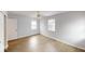 Bright bedroom with a ceiling fan, and hardwood floors at 5014 Melbourne Rd, Indianapolis, IN 46228