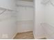 Spacious walk-in closet with shelving for optimal organization at 5014 Melbourne Rd, Indianapolis, IN 46228