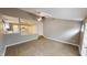 Comfortable living room with an open floor plan and laminated wood flooring at 5014 Melbourne Rd, Indianapolis, IN 46228