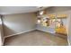 Comfortable living room with an open floor plan and laminated wood flooring at 5014 Melbourne Rd, Indianapolis, IN 46228