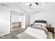 Bright, modern bedroom featuring a vaulted ceiling and a decorative rug at 5014 Melbourne Rd, Indianapolis, IN 46228
