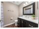 Bathroom featuring a vanity with a quartz countertop and a framed mirror at 505 W Hunters Dr # D, Carmel, IN 46032