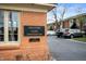 Hunters Glen Condominiums brick signage near well-maintained community parking at 505 W Hunters Dr # D, Carmel, IN 46032