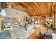 Spacious living room with vaulted wood ceilings and comfortable seating arrangements at , Columbus, IN 47201