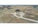 Expansive aerial view of a farm house, surrounding fields, and multiple parking areas at 5189 Abbeygate Blvd, Bargersville, IN 46106
