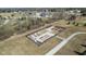 Aerial view of a fenced garden, highlighting raised beds and maintained landscaping at 5189 Abbeygate Blvd, Bargersville, IN 46106