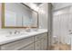 Stylish bathroom featuring a double vanity, framed mirror, and modern fixtures at 5189 Abbeygate Blvd, Bargersville, IN 46106