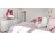 Bright bedroom featuring a TV, comfortable bed, and playful decor at 5189 Abbeygate Blvd, Bargersville, IN 46106