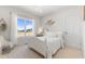 Bright bedroom with large window, white furnishings and modern decor at 5189 Abbeygate Blvd, Bargersville, IN 46106