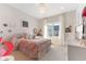 Charming bedroom with pink accents, natural light, and cozy decor at 5189 Abbeygate Blvd, Bargersville, IN 46106