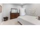 Cozy bedroom featuring a dresser, alphabet tapestry and comfortable bed at 5189 Abbeygate Blvd, Bargersville, IN 46106