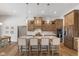 Spacious kitchen with wooden cabinets, stainless steel appliances, and a large island at 5189 Abbeygate Blvd, Bargersville, IN 46106