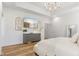 Bright main bedroom with a dresser, TV, and neutral decor, creating a comfortable and relaxing retreat at 5189 Abbeygate Blvd, Bargersville, IN 46106