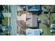 Aerial view of property with a driveway and landscaping at 5402 Basin Park Dr, Indianapolis, IN 46239