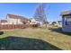 Fenced backyard featuring green lawn at 5402 Basin Park Dr, Indianapolis, IN 46239