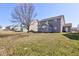 Large, grassy backyard, perfect for outdoor activities and relaxation at 5402 Basin Park Dr, Indianapolis, IN 46239