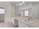A bright bathroom boasts a double sink vanity with modern fixtures and ample counter space at 5402 Basin Park Dr, Indianapolis, IN 46239