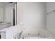 A bathroom features a soaking tub and offers a serene and spa-like experience at 5402 Basin Park Dr, Indianapolis, IN 46239