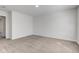 Neutral bedroom with soft carpet and an open doorway at 5402 Basin Park Dr, Indianapolis, IN 46239