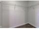 Walk-in closet featuring white walls and wire shelving, providing ample storage space at 5402 Basin Park Dr, Indianapolis, IN 46239