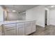 Spacious kitchen island with lots of storage and room for seating at 5402 Basin Park Dr, Indianapolis, IN 46239