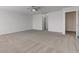 The expansive main bedroom features neutral carpet, a ceiling fan and white trim at 5402 Basin Park Dr, Indianapolis, IN 46239