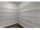 Walk-in pantry with wire shelving for storage of food and kitchen items at 5402 Basin Park Dr, Indianapolis, IN 46239