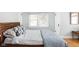 Cozy bedroom with natural light and hardwood floors at 5426 Broadway St, Indianapolis, IN 46220