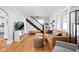 Cozy living room with hardwood floors, a comfortable sofa, and a classic interior design at 5426 Broadway St, Indianapolis, IN 46220