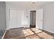 Bedroom featuring hardwood floors, neutral walls and double door closet at 5855 Dapple Trce, Indianapolis, IN 46228