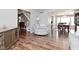 Welcoming living room showcasing hardwood flooring and a view of the adjacent dining room at 5855 Dapple Trce, Indianapolis, IN 46228