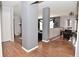Bright living space with wood floors and columns, offering an open and inviting atmosphere at 5855 Dapple Trce, Indianapolis, IN 46228