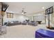Finished basement area with plush carpet, couches, pool table, and basketball hoop for entertainment at 6024 N County Road 50 W, Lizton, IN 46149