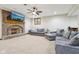 A comfortable basement area with furniture and a brick fireplace, perfect for cozy evenings at 6024 N County Road 50 W, Lizton, IN 46149