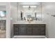 Bathroom featuring a double vanity, granite countertops, and decorative mirror at 6024 N County Road 50 W, Lizton, IN 46149