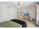 Bedroom featuring carpet, ceiling fan, and ensuite access at 6024 N County Road 50 W, Lizton, IN 46149