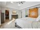 Bright main bedroom with vaulted ceiling, barn door, and walk-in closet access at 6024 N County Road 50 W, Lizton, IN 46149