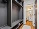 Mudroom with gray built-in shelves and access to the bathroom at 6024 N County Road 50 W, Lizton, IN 46149