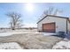 View of the outbuilding and the surrounding area, with ample parking at 6024 N County Road 50 W, Lizton, IN 46149